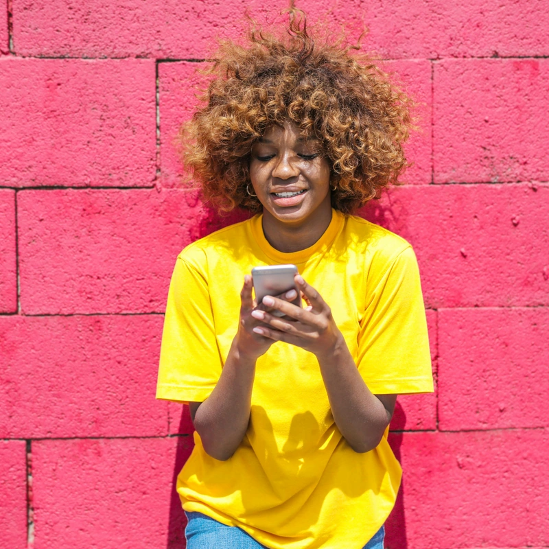 Person downloading app from the App Store on smartphone